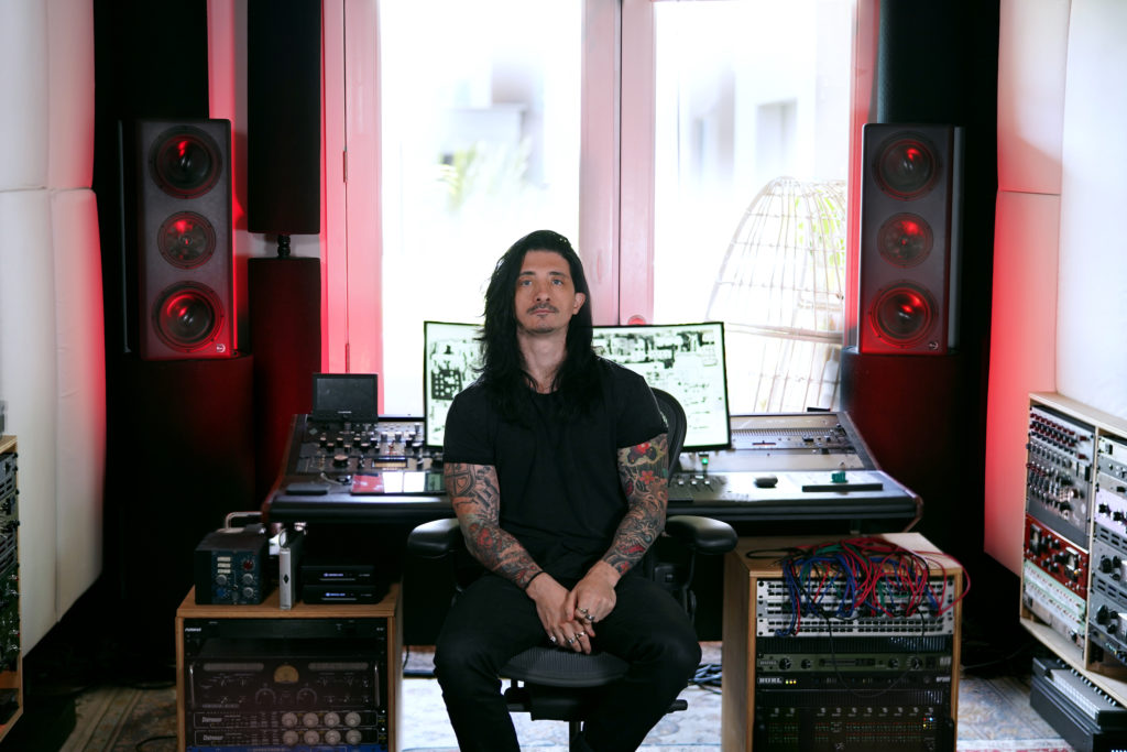 Richie Beretta in his studio with Ex Machina Soundworks reference monitors
